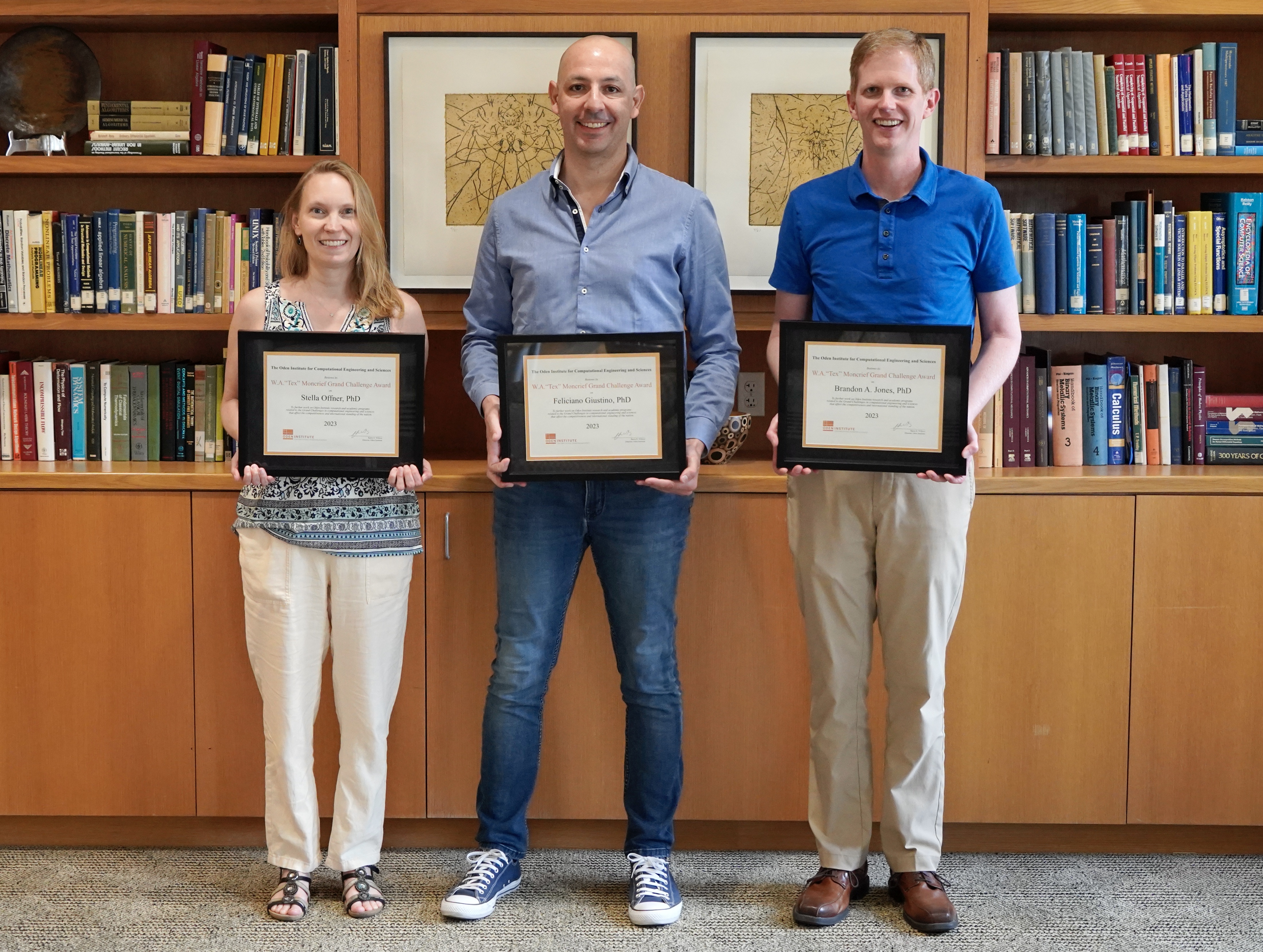 Stella Offner (l), Feliciano Giustino (c) and Brandon Jones (r) receive their Grand Challenge Awards.