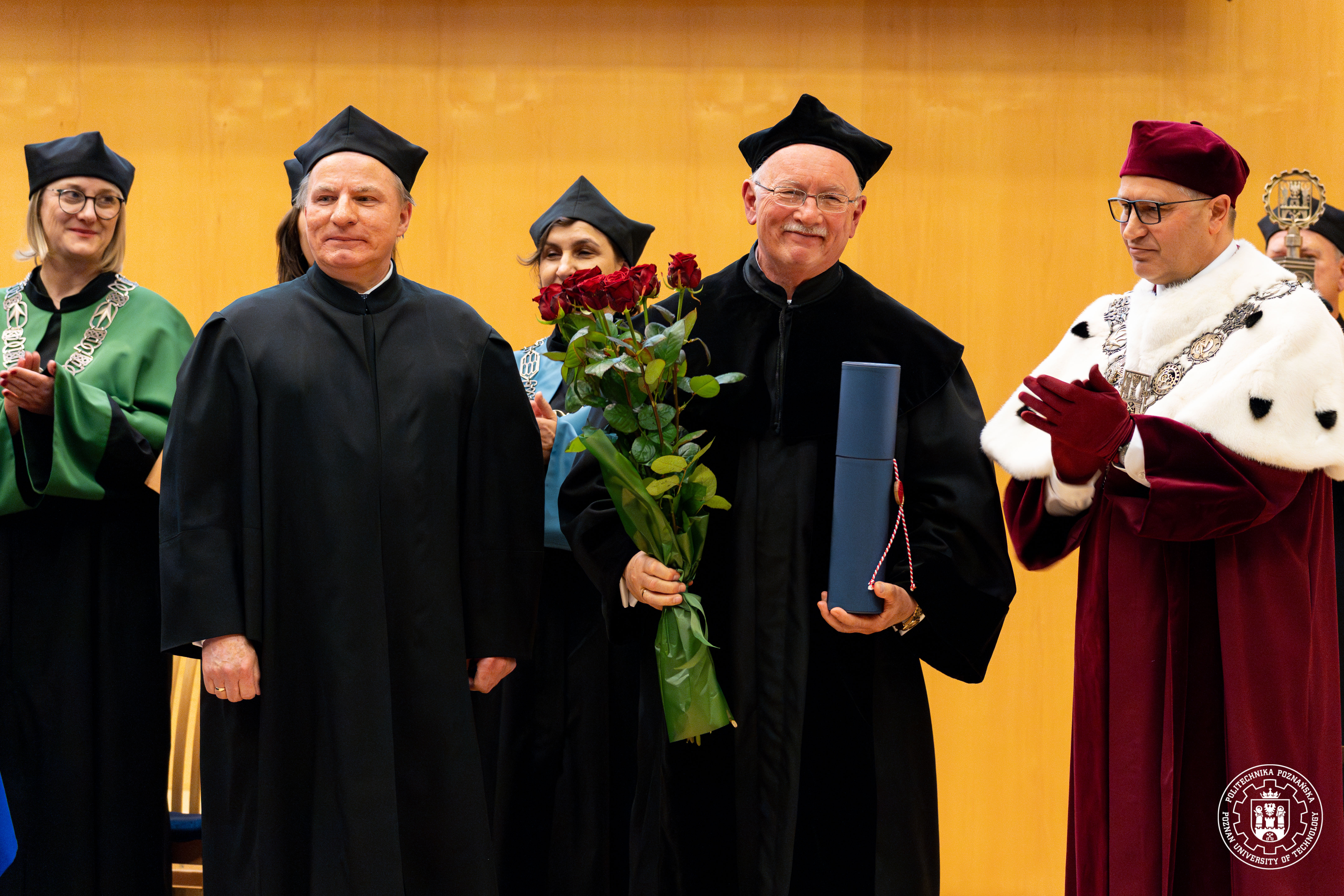 Leszek Demkowicz (center) with Mieczysław Kuczma (left), and Prof. Dr. Hab. Eng. Teofil Jesionowski, (right), Rector of Poznan University of Technology. Photo courtesy of Poznan University of Technology.