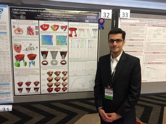 Student Amir Khalighi receives the Best Poster prize